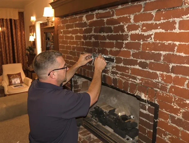 Kendale Lakes Chimney Sweep expert fixing a fireplace in Kendale Lakes, FL
